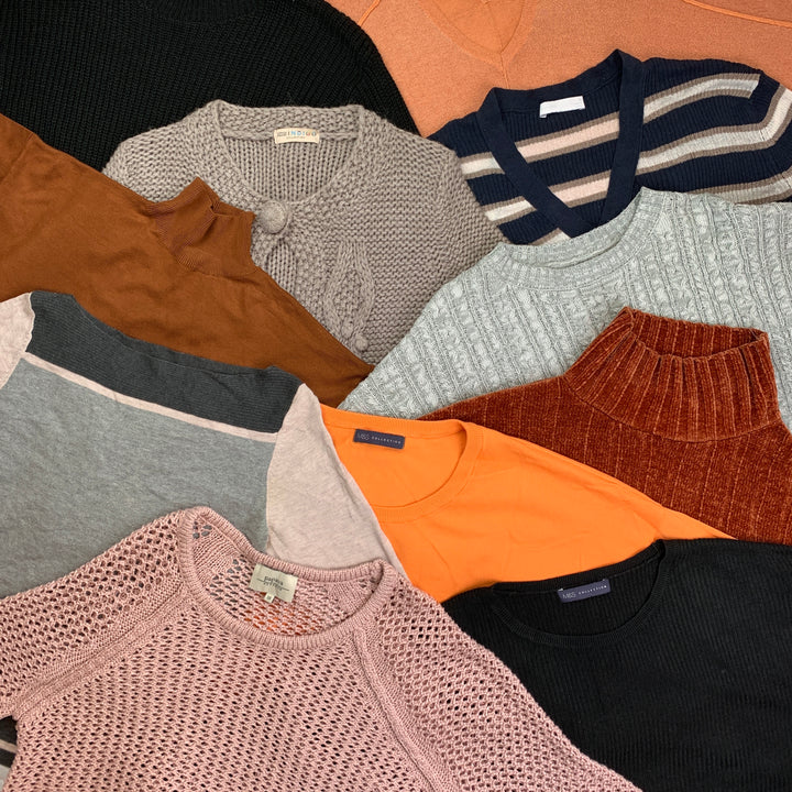 Collection of various sweaters in different colors and styles.